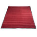 A red carpet mat with black border.