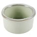 A white bowl with a sagebrush green rim.