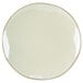A white plate with a gold rim.