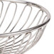 An American Metalcraft stainless steel oval basket with a spiral handle.