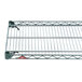 A green Metroseal wire shelf on a metal grid.