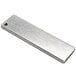 A rectangular metal object with a hole in the middle.