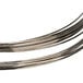 A close-up of a stack of silver wires.