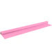 A pink plastic roll of paper.