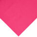 A hot magenta pink plastic table cover.