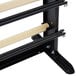 A black metal Bulman countertop paper cutter rack with wood bars.