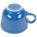A Fiesta Lapis china coffee cup with a white handle.