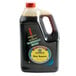 A Kikkoman 1 gallon bottle of soy sauce.