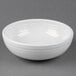 A Fiesta white china bistro bowl on a gray surface.