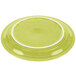 A Lemongrass yellow Fiesta® plate with a white rim.