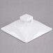 a white square object with a handle