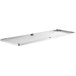 A white metal shelf that attaches to a Regency stainless steel work table.