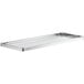 A silver stainless steel undershelf for a rectangular table.