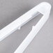 White plastic tongs.