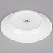 A Tuxton bright white china plate with an embossed design.