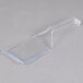 A clear plastic spatula with a handle.