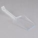 A clear plastic spatula with a long handle.