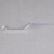 A clear plastic spatula with a handle.