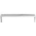 A white metal Regency wall shelf.
