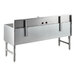 An Advance Tabco 3 compartment stainless steel underbar sink with 2 drainboards and a faucet.