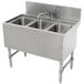 An Advance Tabco stainless steel underbar sink with three bowls and a deck mount faucet.