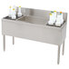 A stainless steel Advance Tabco underbar ice bin and bottle storage combo unit.