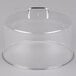 A clear plastic dome lid for a cake stand.