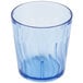 A blue plastic tumbler with a wavy design.