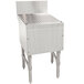 A stainless steel Advance Tabco Prestige Series bar drainboard with a drain on it.