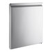 A white rectangular object with a metal frame.