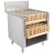 A stainless steel Advance Tabco glass rack storage cabinet with glasses in it.