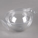 A clear plastic bowl with a clear lid.