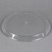 A clear plastic Marco Company shallow tray with a small circular hole in the center.