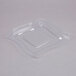 A clear plastic lid with a square edge.