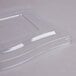 A clear Fineline PET flat lid for a square serving bowl.