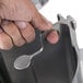 A person holding a Robot Coupe Pusher Feed Head Assembly part.