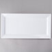 A white rectangular melamine serving platter.