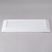 A white rectangular Elite Global Solutions melamine serving platter.