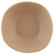 An Elite Global Solutions irregular-shaped paper bag-colored bowl.