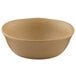 An Elite Global Solutions paper bowl in a beige round bowl.