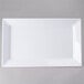 A white rectangular Elite Global Solutions melamine serving platter.