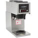 A Bloomfield stainless steel and black pour over coffee brewer.