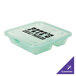 A jade green plastic GET 3-compartment take out container on a counter.