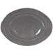 A grey oval melamine serving dish with a spiral pattern.