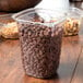 A plastic container of chocolate chips.