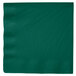 A hunter green paper napkin.