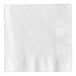 A close-up of a white Creative Converting 3-ply beverage napkin.