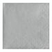 A white napkin with a diamond pattern.