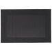 A black rectangular Snap Drape Taos Charcoal placemat with a white border.