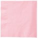 A pink napkin with a white border.